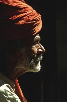 Wrinkled: Profile portrait of beared Indian man
