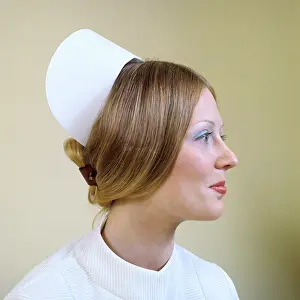 Providers: Profile Portrait Registered Nurse Wearing Cap and