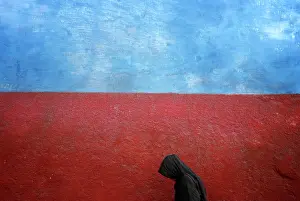 Ble001: Profile View of Anonymous Woman in Black Walking