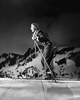 Nimble: Profile of a young woman skiing