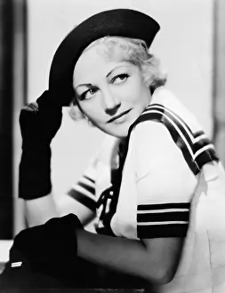 Loveliness: Profile of a young woman wearing a hat