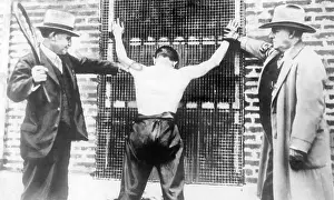 Whipped: Prohibition: Alcohol-thief is being whipped, Oklahoma, 1