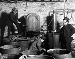 Distillery: Prohibition: Raid of barrels in America, 1928