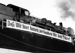 201626: Propaganda poster at a construction site