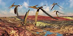 Pteranodon: Pteranodons fly over a mountainous landscape in