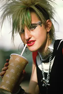 Macdonalds: Punk haired girl drinking branded drink