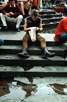 Martens: Punk Reading the Sun Newspaper