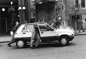 Charing: Pushing a broken-down Renault 5 car