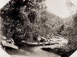 Cataract: Pushing a canoe through a river cataract, Madagascar