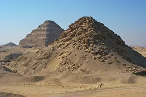 Pyramids: Pyramid of Userkaf. At background, Djoser Pyramid. Egypt