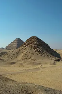 Pyramids: Pyramid of Userkaf. At background, Djoser Pyramid. Egypt
