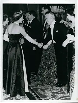 Comics: Queen Elizabeth II and Charlie Chaplin