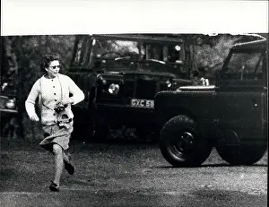 Corgis: Queen Elizabeth II chasing escaped corgis, Windsor