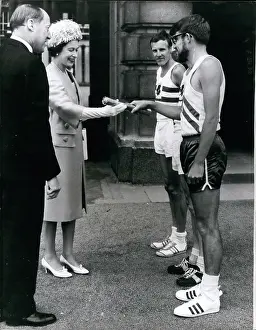 Forecourt: Queen Elizabeth II with three Commonwealth athletes