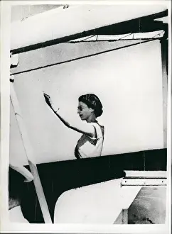 Enroute: Queen Elizabeth II waving from Gothic liner