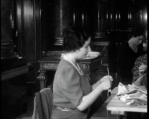 Hosted: Queen Elizabeth Knitting at a Large Sewing