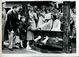 Cheam: Queen of the Fair at Cheam in ancient stocks