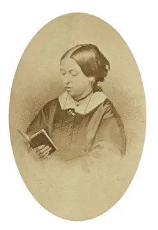 Queen Victoria reading a book