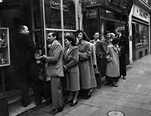Tobacconists: Queue for a tobacconists, London 1940s