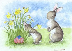 Clump: Two rabbits finding an Easter Egg in daffodils