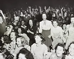 Rs3wn: Racially integrated audience listens as singer