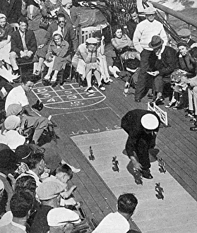 Petits: Racing with petits chevaux on deck of Mauretania