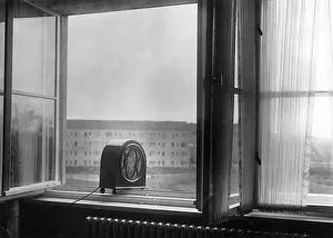 Annoy: Radio in the open window of a Berlin tenement, 1931