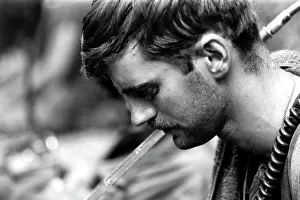 Stocktrek Images: A radio operator takes a breather during fighting