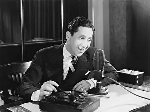 Liveliness: Radio talk show host speaking into a microphone