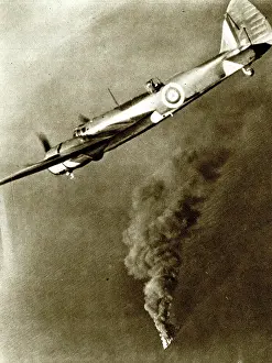 Tanker: RAF bomber with German tanker on fire below, WW2
