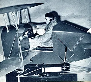 Link: RAF cadet learning on a link trainer, WW2