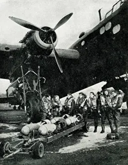 Bombs: RAF crew prepare for night bombing in Germany, WW2
