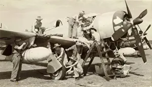 Batavia: An RAF ground crew service a Republic P-47 Thunderbolt