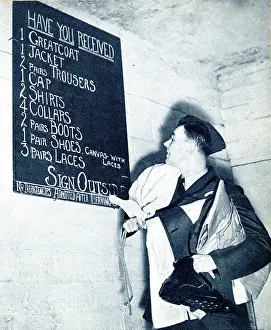 Cadet: RAF recruit checking the kit list, WW2