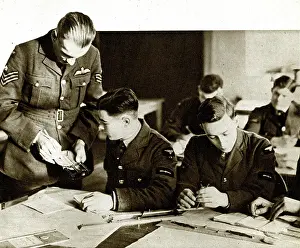 Courses: RAF trainee pilots working out courses and speeds, WW2