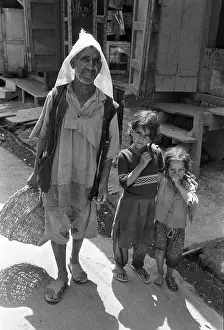 Jammu: Ragged man and children, Kashmir