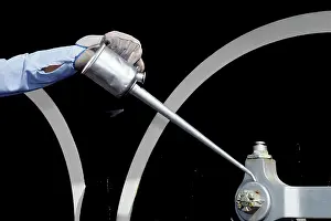 Oiling: Railroad Engineer Holding Long Spout Oil Can