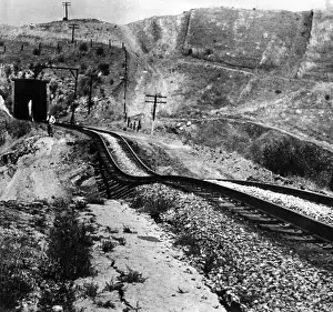 Tectonics: Railroad tracks damaged by an earthquake. ?