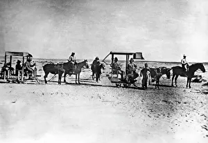 Mules: Railway cars pulled by mules in Mesopotamia, 1916