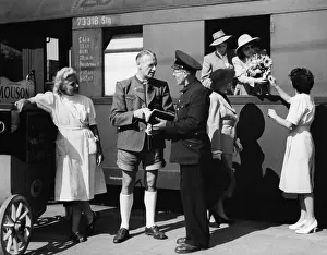 Lederhosen: railway, station, at the train, Germany, 1950s