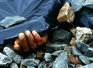 Ballast: Railway violence. The hand of dead body is visible