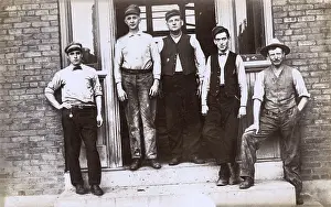 Shabby: Railway workers outside their work premises, USA