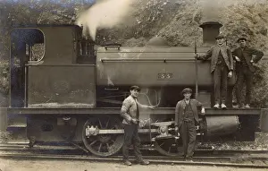 Lucinda Moore: Railway workers pose with steam engine