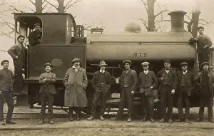 Lucinda Moore: Railway workers pose with steam engine