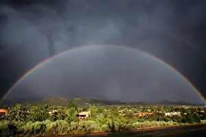 Refraction: Full Rainbow and Storm Over Santa
