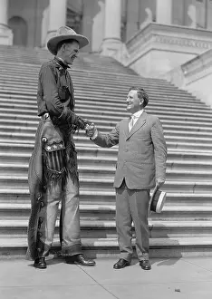 Gigantism: Ralph E. Madsen, the Tall Cowboy, shaking hands