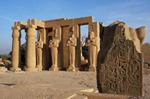 Theban: Rameseum. Pillars with osirian statues. Egypt