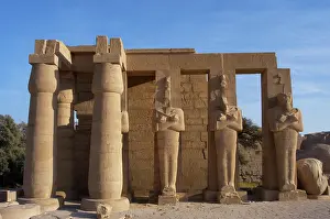 Mortuary: Rameseum. Pillars with osirian statues. Egypt