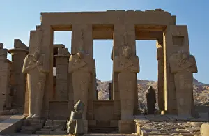Mortuary: Rameseum. Pillars with osirian statues. Egypt