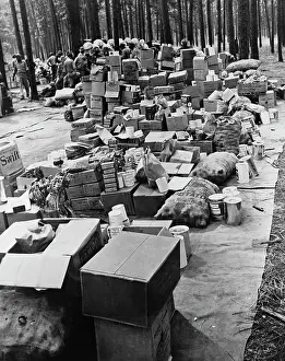 Inspecting: Rations before being loaded into trucks during